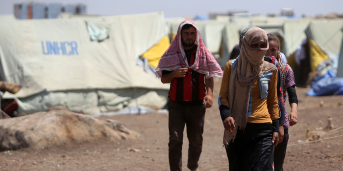 Trafic d'êtres humains : Guerre et changement climatique comme "causes principales"